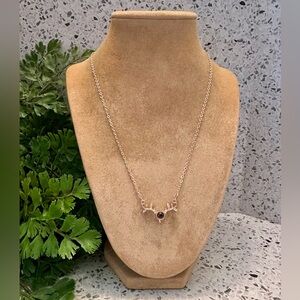 Copper tone fine necklace with gem and rhinestones